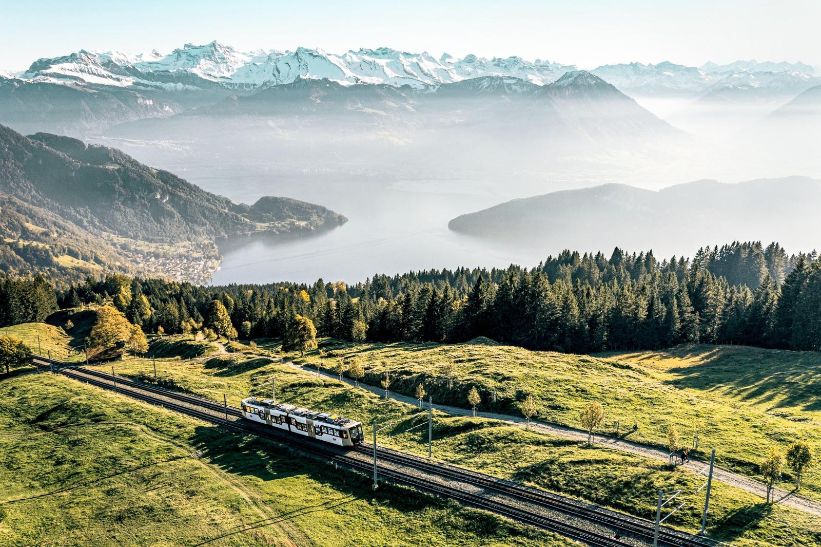 The Rigi cogwheel railway climbing above Lake Lucerne
